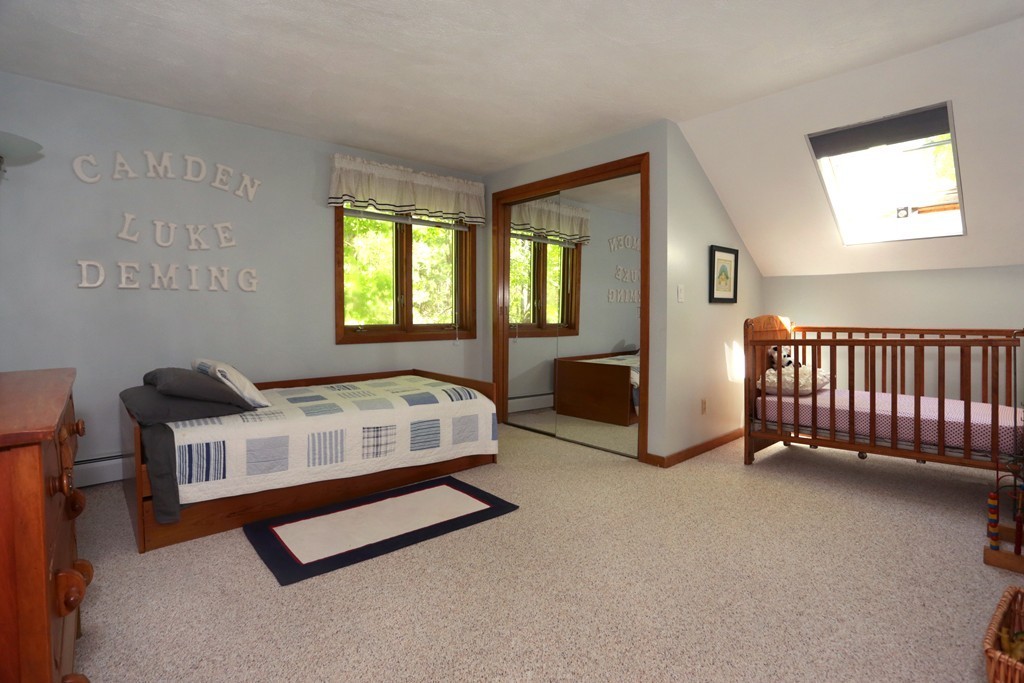 63 Porter Road Boxford, MA 01921 - Photo 13 of 30 a bedroom with furniture and a window
