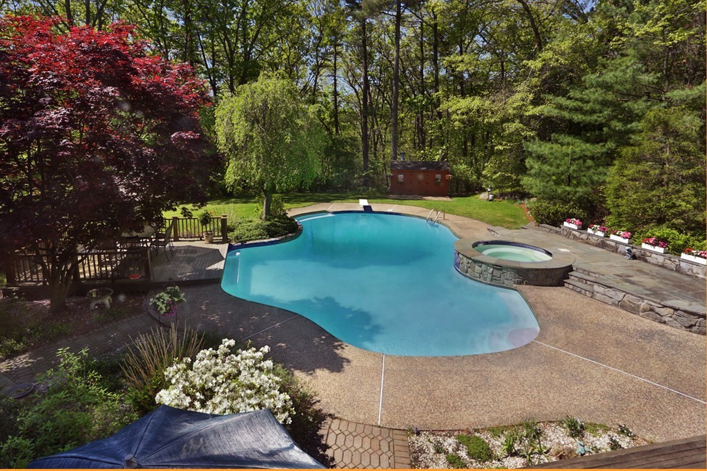 63 Porter Road Boxford, MA 01921 - Photo 17 of 30 an aerial view of a house with a yard and trees