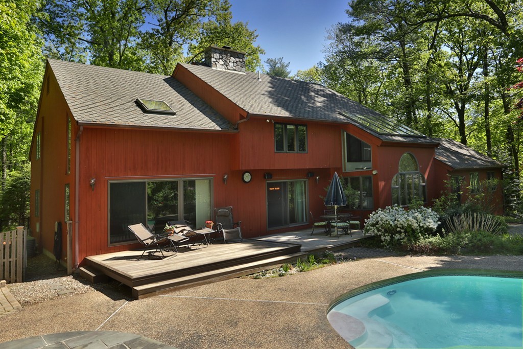 63 Porter Road Boxford, MA 01921 - Photo 18 of 30 a view of a house with backyard and sitting area