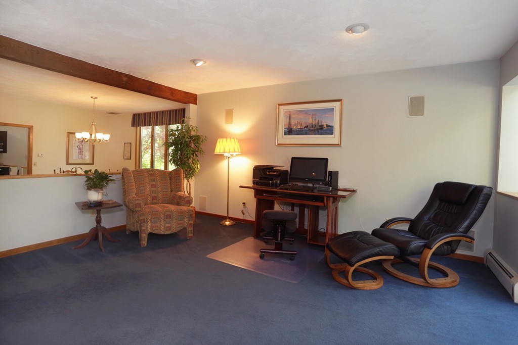 63 Porter Road Boxford, MA 01921 - Photo 25 of 30 a living room with furniture and a piano