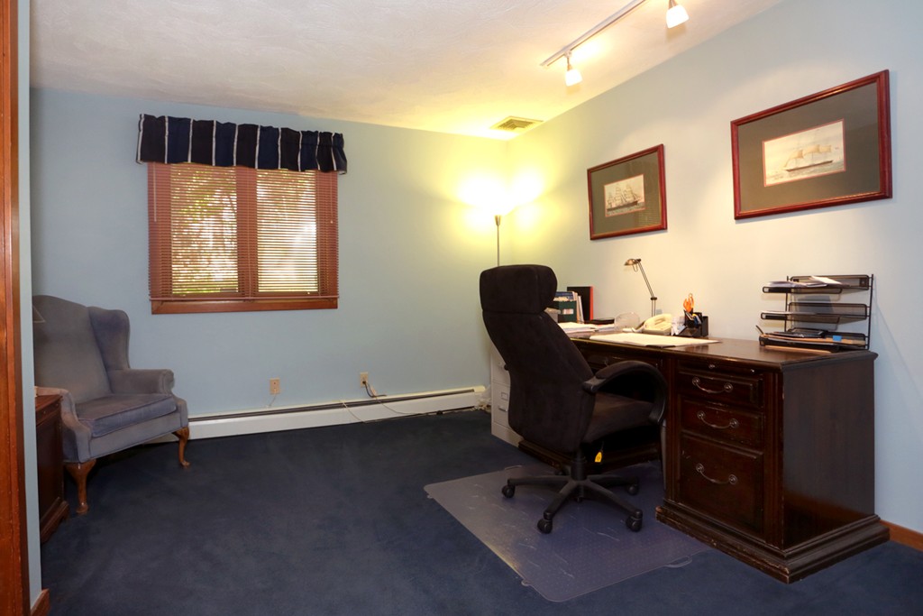 63 Porter Road Boxford, MA 01921 - Photo 30 of 30 a view of a workspace with furniture and a window