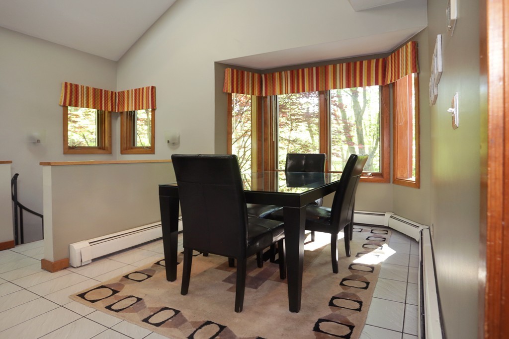 63 Porter Road Boxford, MA 01921 - Photo 5 of 30 a view of a dining room with furniture window and outside view