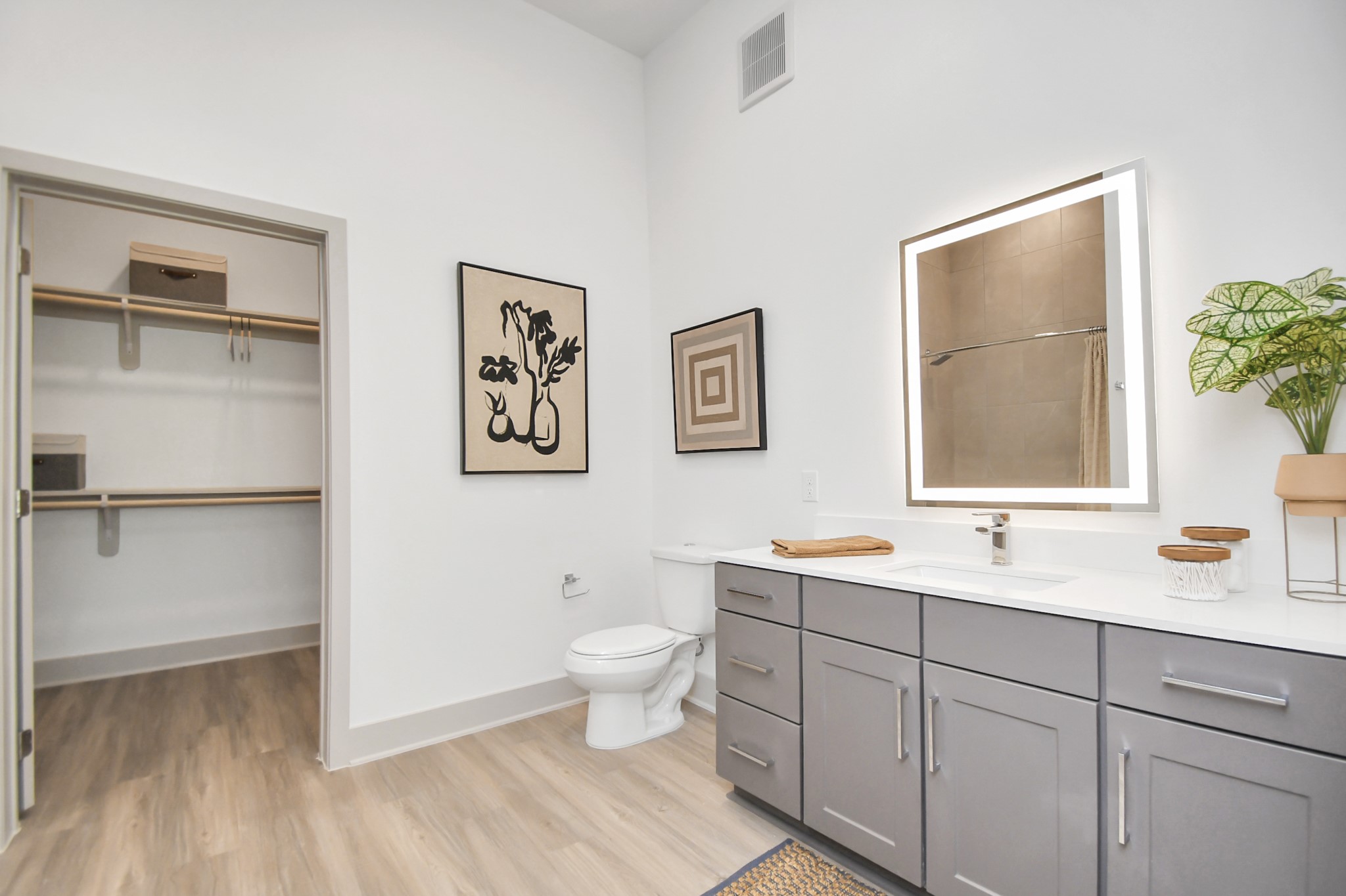 1617 Enid Street, Unit 177 Houston, TX 77009 - Photo 25 of 50 a bathroom with a toilet sink and mirror
