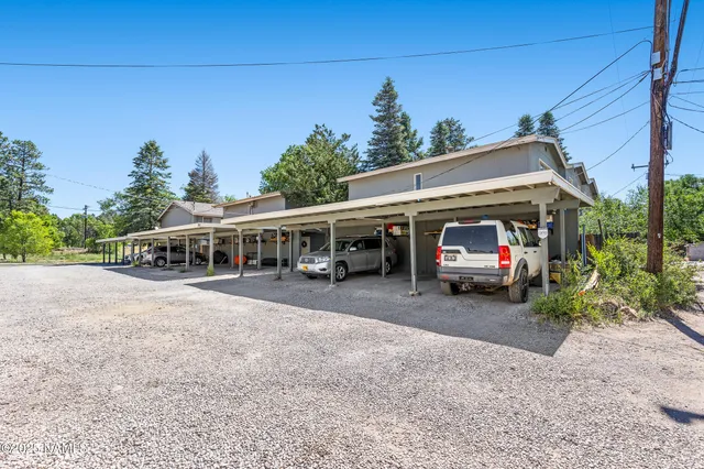 a view of a house with brick walls