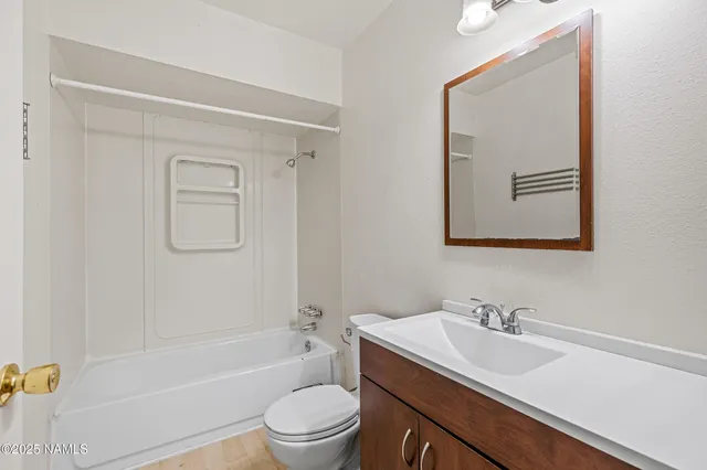 a view of backyard with cabin