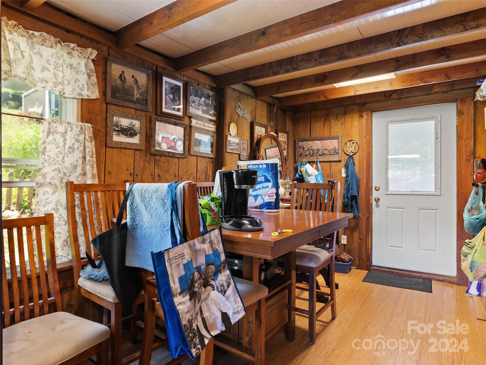 165 Van Arrington Road Clyde, NC 28721 - Photo 11 of 17 a dining room with furniture and window