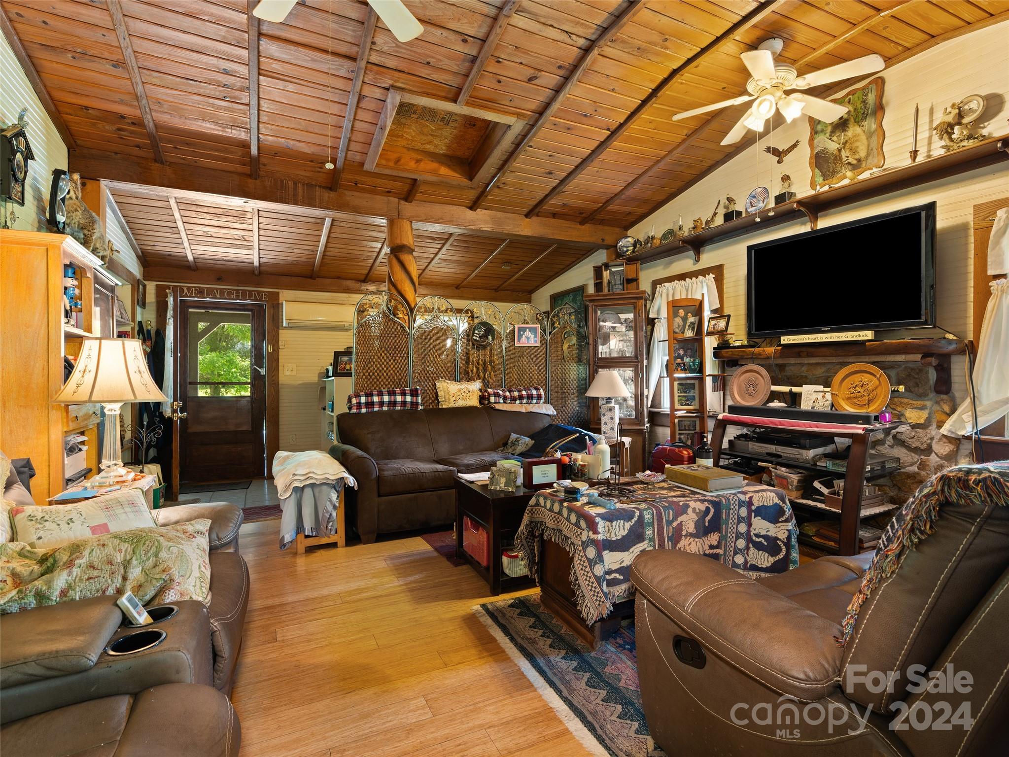 165 Van Arrington Road Clyde, NC 28721 - Photo 7 of 17 a view of a garage with tv