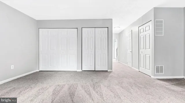 an empty room with a natural light