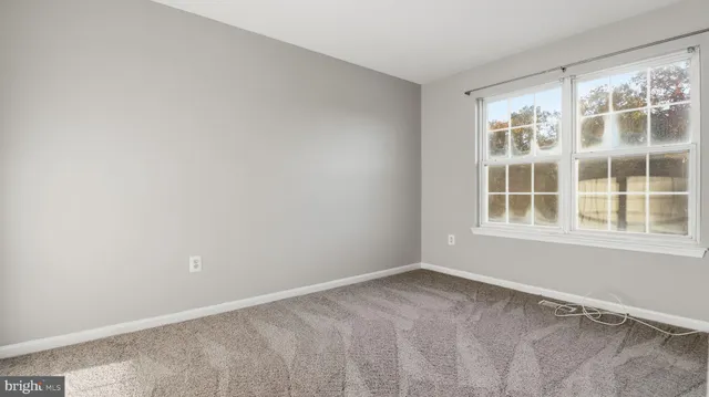 a bathroom with a mirror and a sink
