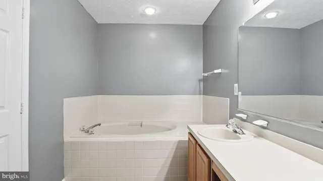 a bath tub sitting in a bathroom