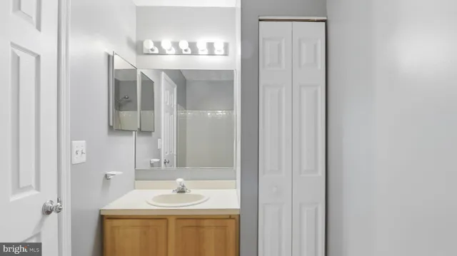 a view of a park with iron fence