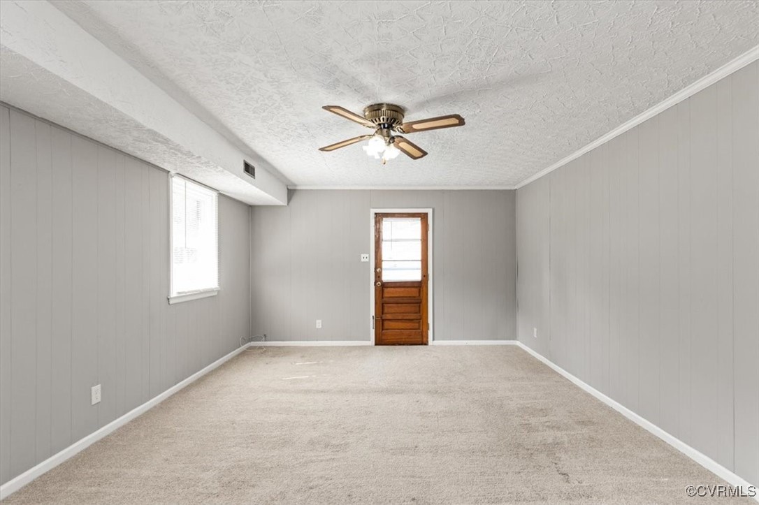 7801 Bull Hill Road Prince George, VA 23875 - Photo 20 of 49 Unfurnished room featuring a ceiling fan, a textur
