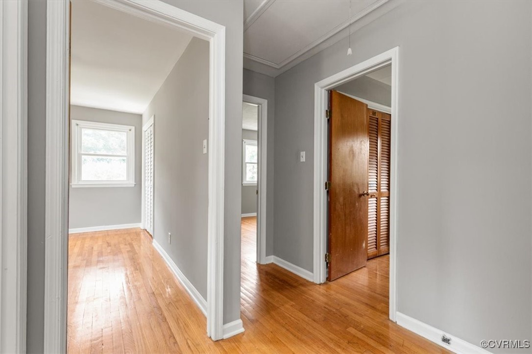 7801 Bull Hill Road Prince George, VA 23875 - Photo 30 of 49 Corridor featuring light wood-style floors and att