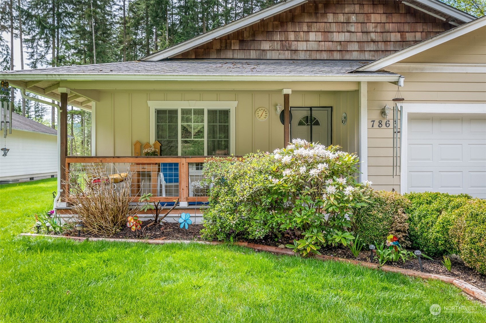 7863 Santa Fe Trail Maple Falls, WA 98266 - Photo 23 of 30 a front view of a house with garden