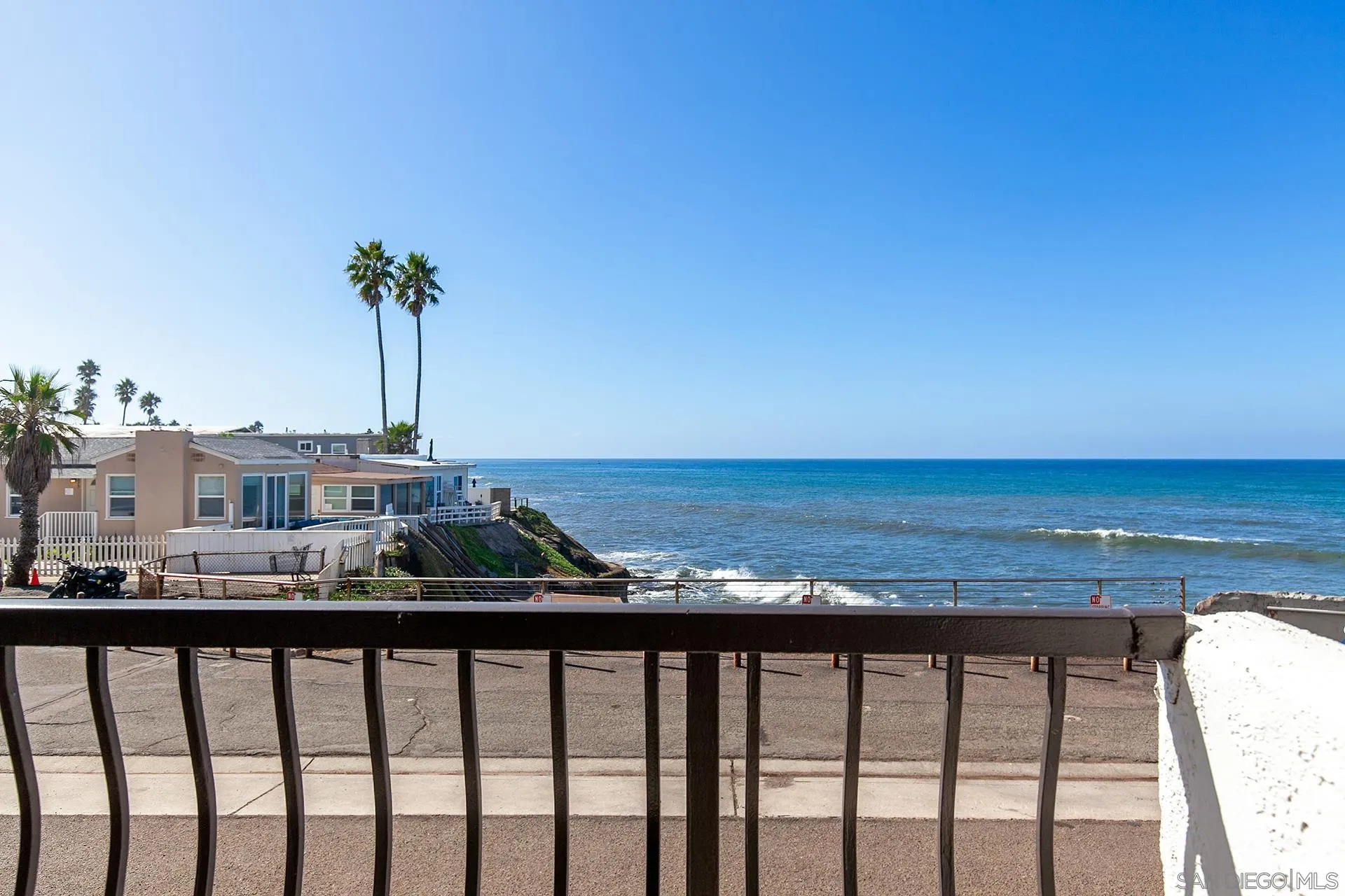 4878 Pescadero Avenue, Unit 103 San Diego, CA 92107 - Photo 20 of 72 a view of a balcony with an ocean view