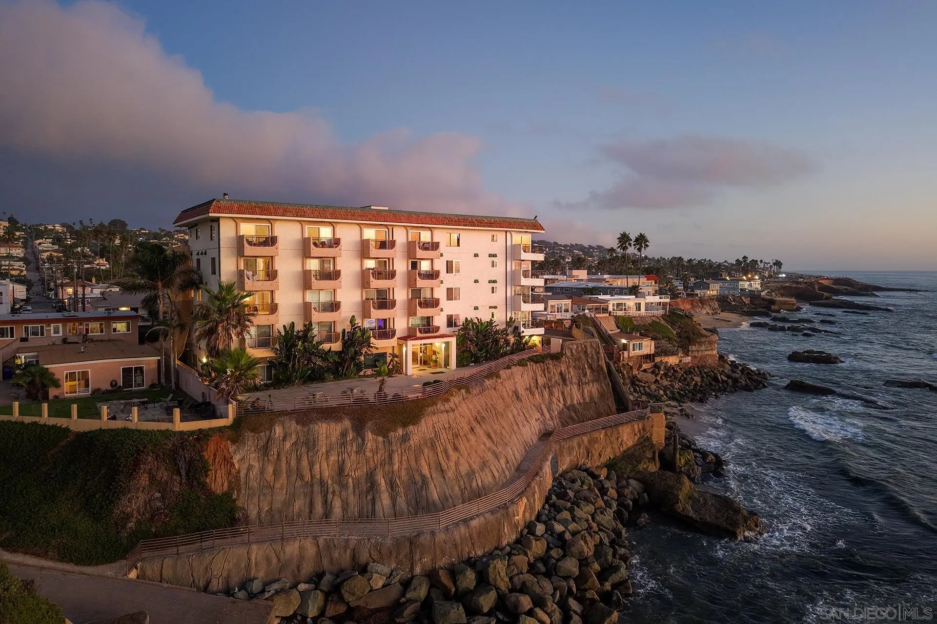 4878 Pescadero Avenue, Unit 103 San Diego, CA 92107 - Photo 39 of 72 a view of a chairs and table in a balcony