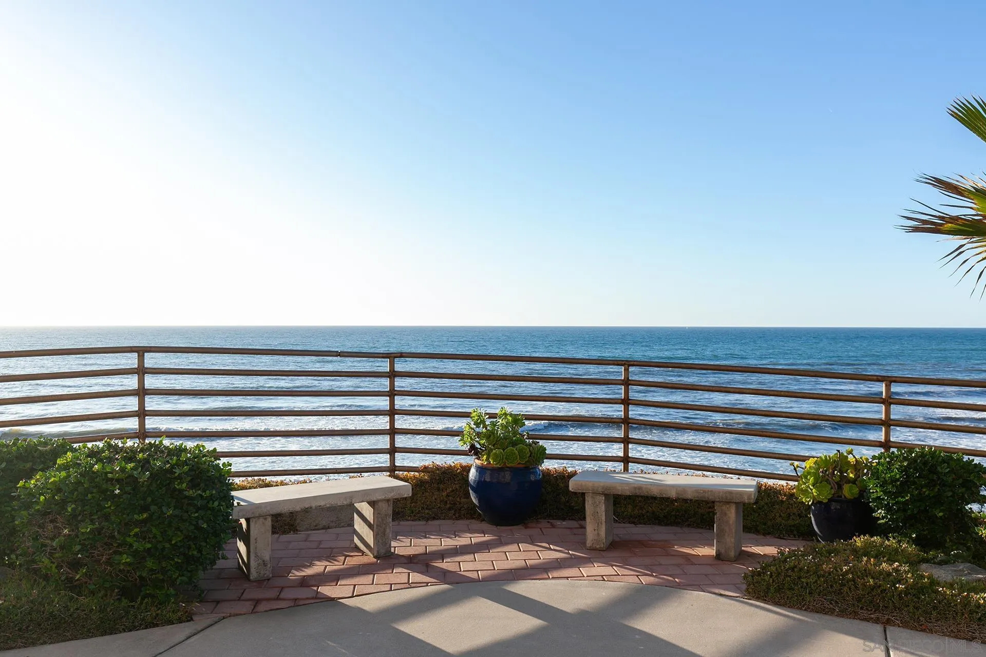 4878 Pescadero Avenue, Unit 103 San Diego, CA 92107 - Photo 64 of 72 a view of a terrace with a bench
