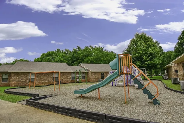 a view of a house with a park