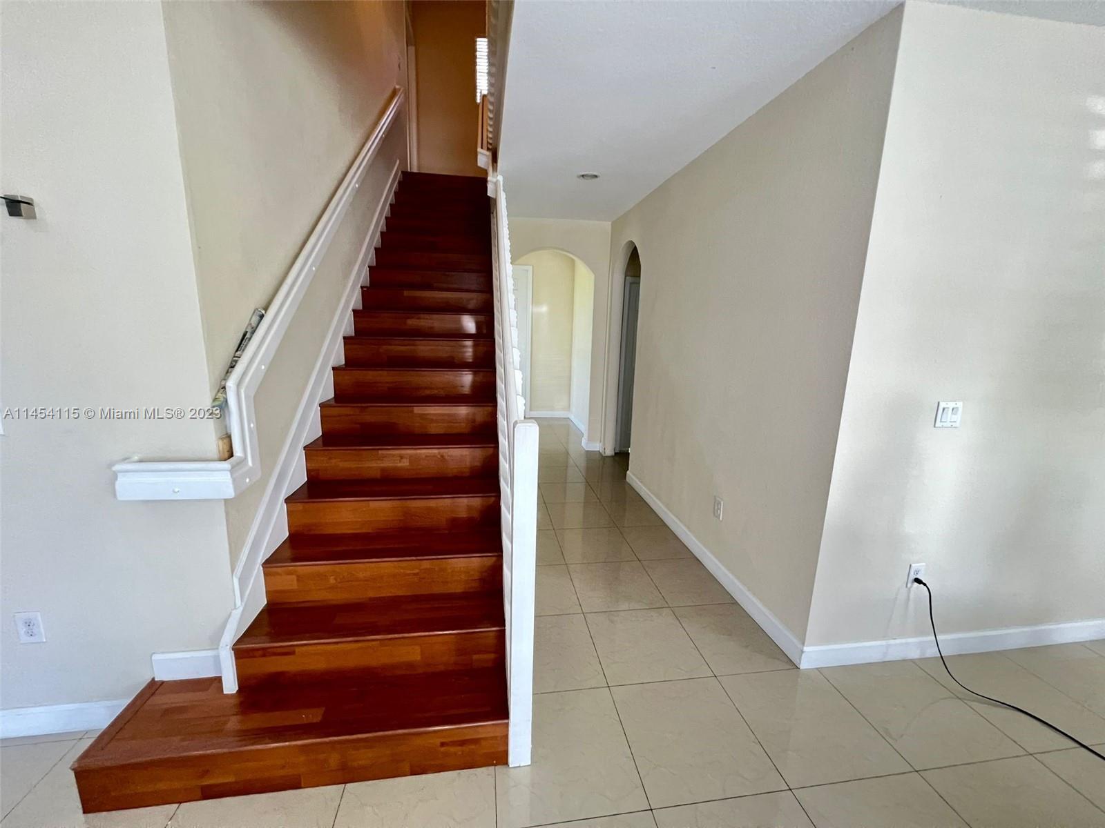 17182 Southwest 92nd Street Miami, FL 33196 - Photo 18 of 46 a view of entryway with wooden floor