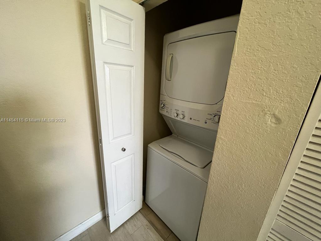 17182 Southwest 92nd Street Miami, FL 33196 - Photo 24 of 46 a utility room with dryer and washer
