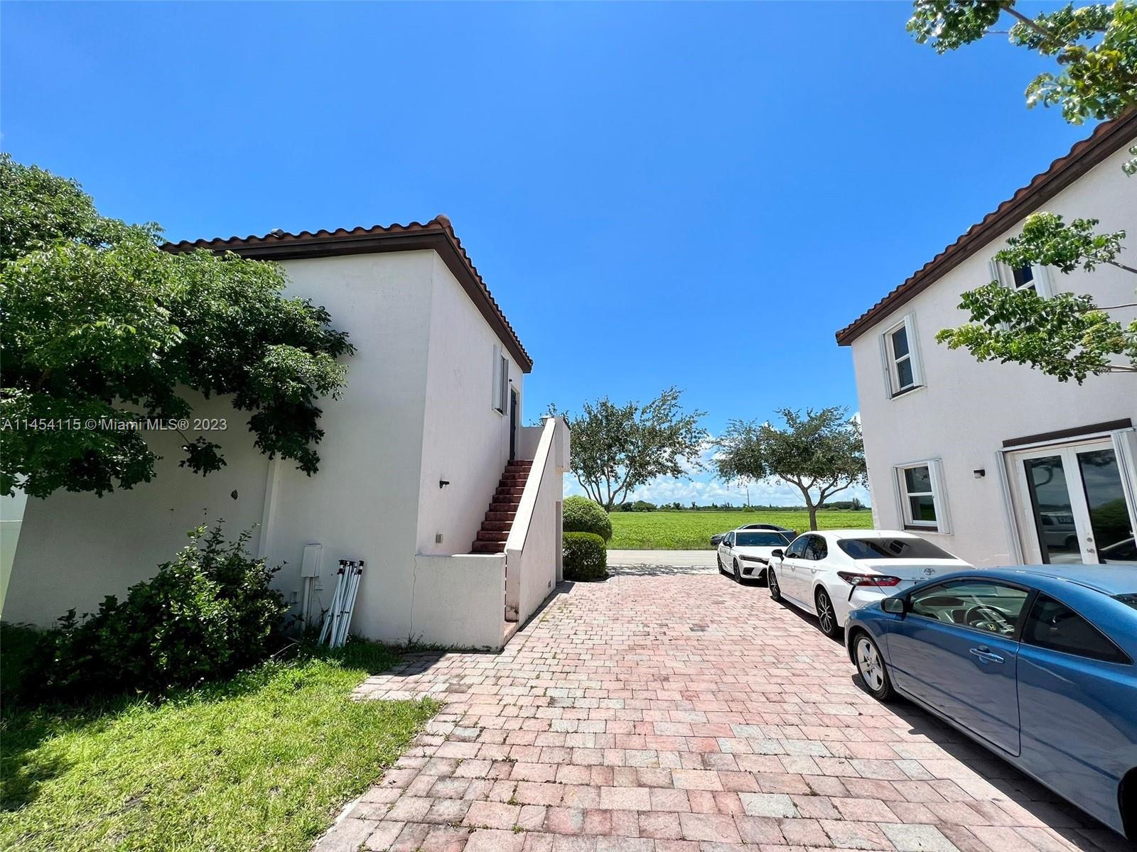17182 Southwest 92nd Street Miami, FL 33196 - Photo 25 of 46 a view of outdoor space and yard