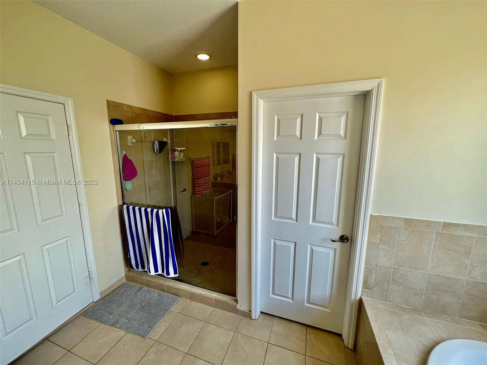 17182 Southwest 92nd Street Miami, FL 33196 - Photo 28 of 46 a view of entryway with wooden floor