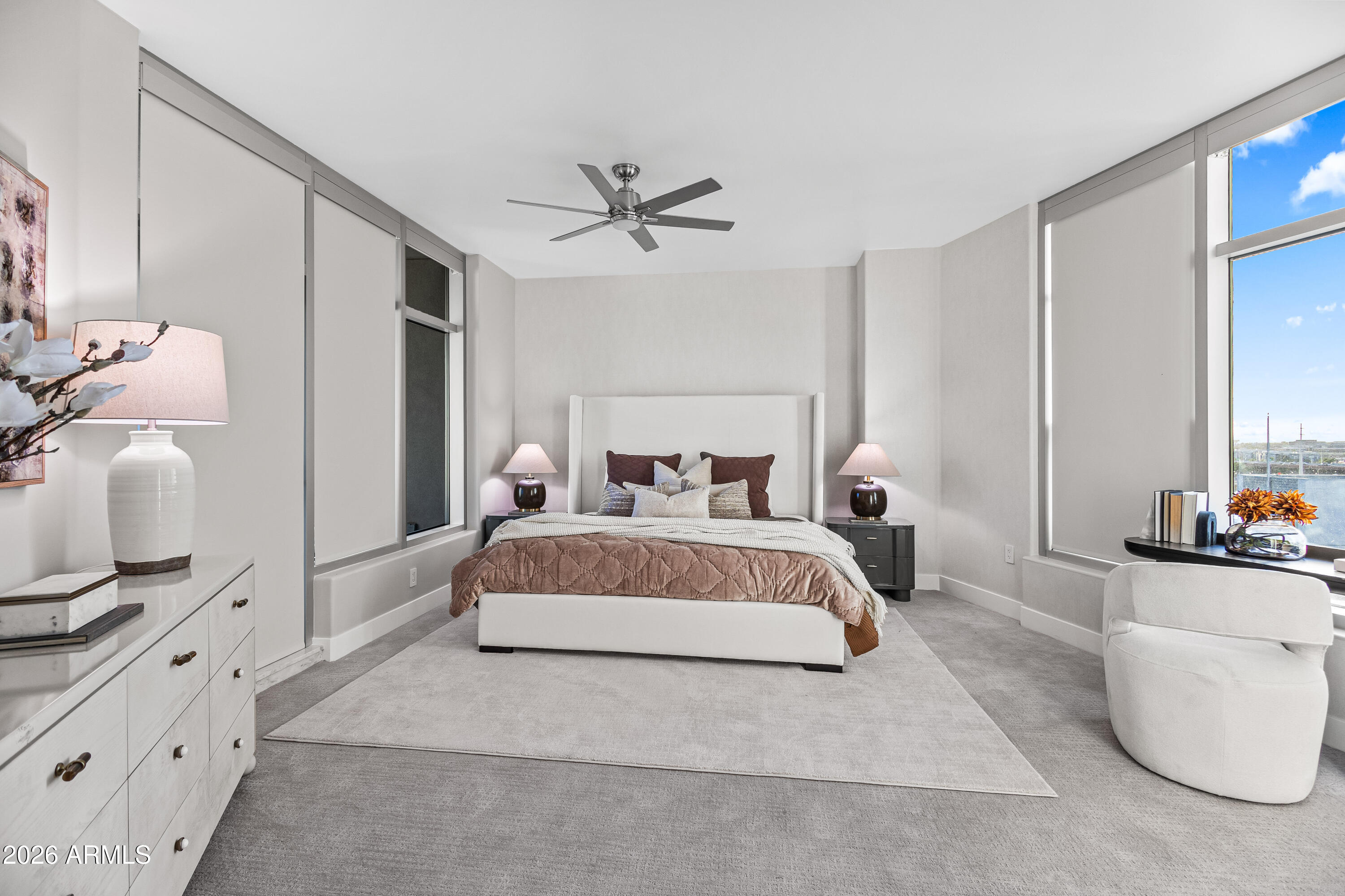 140 East Rio Salado Parkway, Unit 1101 Tempe, AZ 85281 - Photo 10 of 32 a bedroom with a bed and a couch