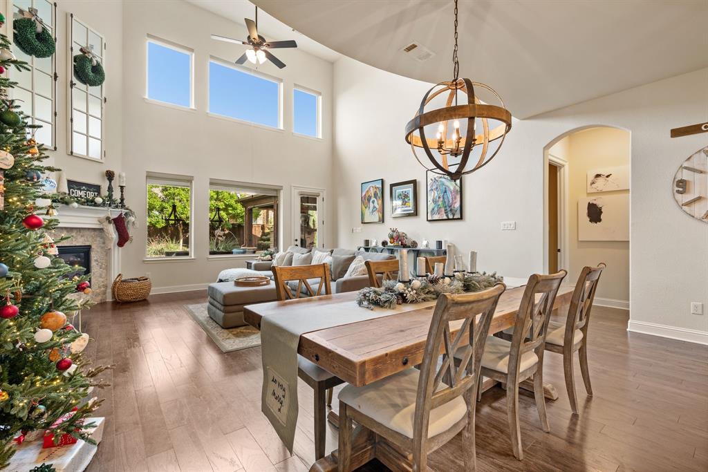 448 Rock Springs Road Coppell, TX 75019 - Photo 11 of 40 a view of a dining room with furniture window and wooden floor