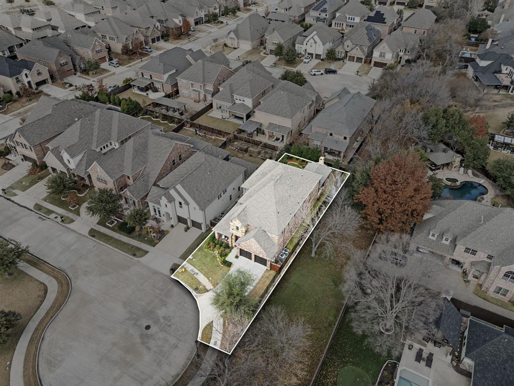 448 Rock Springs Road Coppell, TX 75019 - Photo 29 of 40 an aerial view of a house with a yard