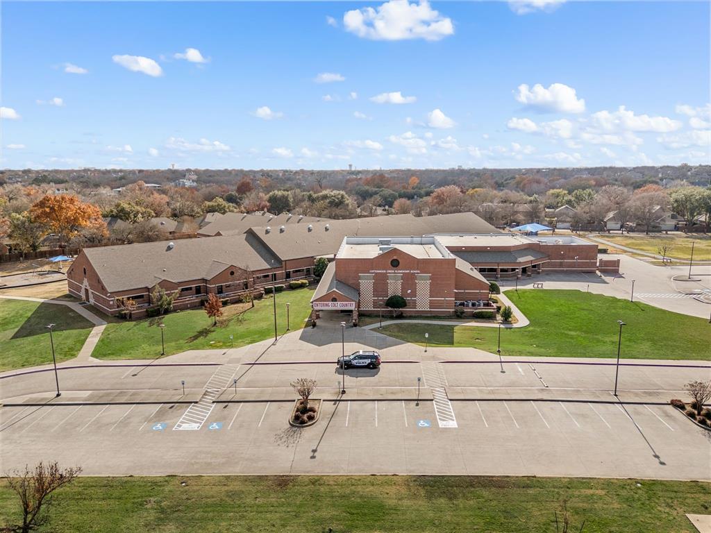 448 Rock Springs Road Coppell, TX 75019 - Photo 37 of 40 an aerial view of a house with a big yard