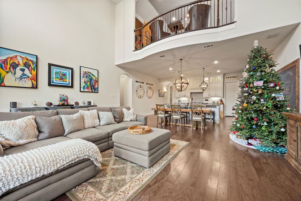 448 Rock Springs Road Coppell, TX 75019 - Photo 10 of 40 a living room with furniture and a potted plant