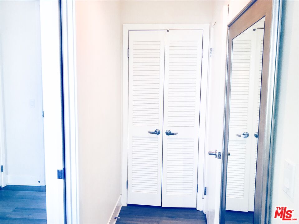 1241 5th Street, Unit 502 Santa Monica, CA 90401 - Photo 17 of 33 a view of an entryway with wooden floor