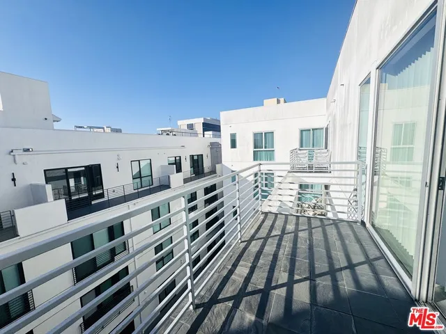 a view of a living room with furniture