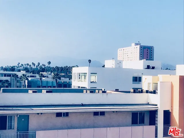 a view of a city with tall buildings