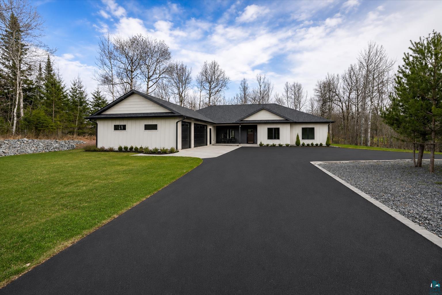 4966 Anderson Road Hermantown, MN 55811 - Photo 2 of 52 Driveway and concrete apron have been AI generated.