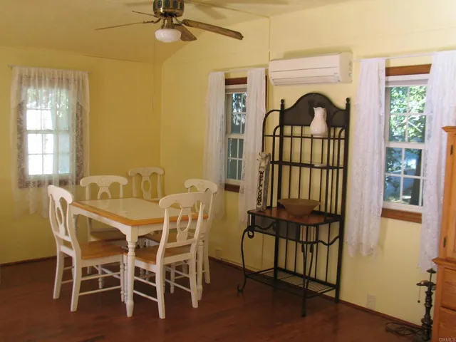 a view of a livingroom with furniture