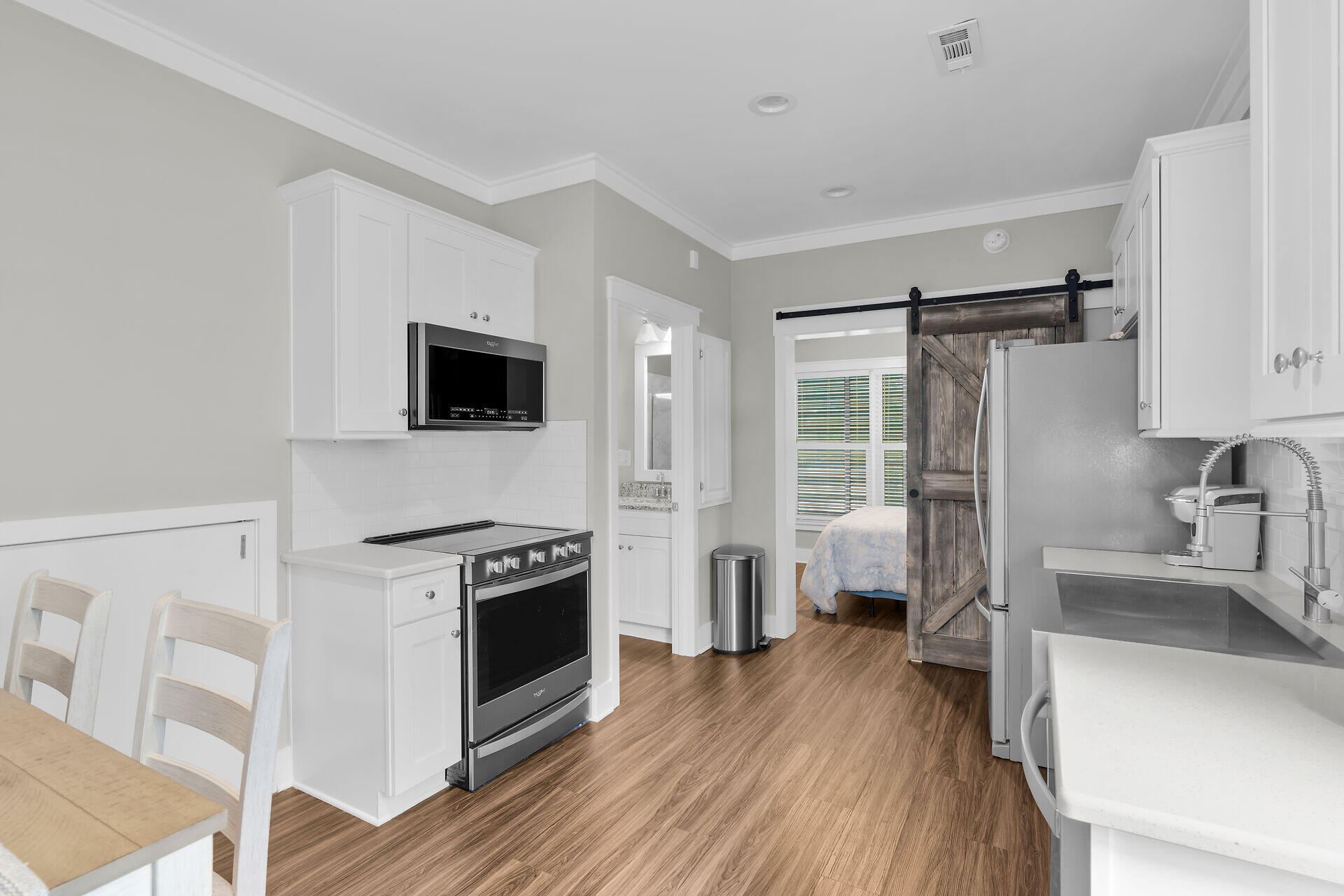 101 11th Street, Unit 19 Marathon, FL 33050 - Photo 5 of 27 a kitchen with stainless steel appliances a stove a refrigerator and a sink