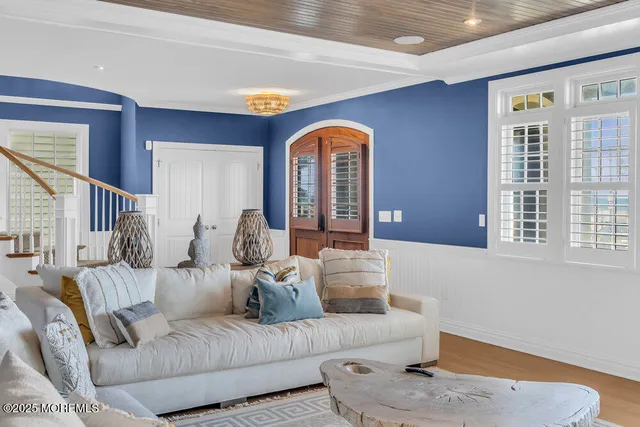 a living room with furniture and a table