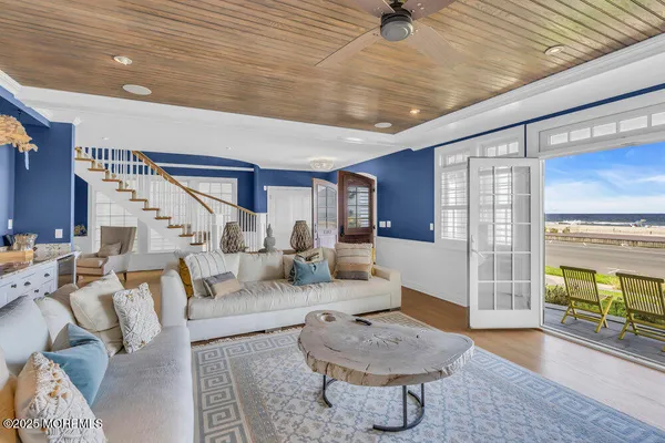 a living room with furniture fireplace and a fireplace
