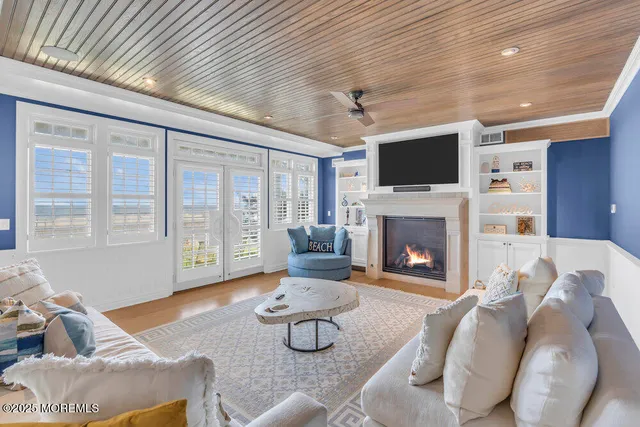 a bedroom with two beds and a window