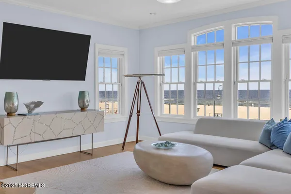 a kitchen with stainless steel appliances granite countertop a sink a stove and a table