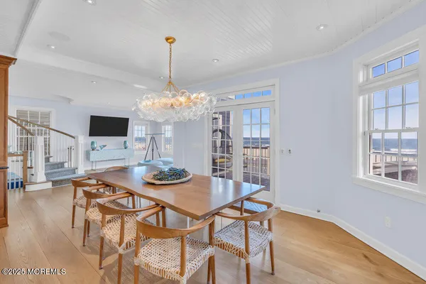 a bedroom with two beds and a window