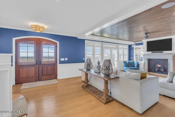 a living room with furniture and a table