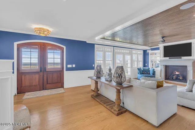 a living room with furniture fireplace and a fireplace
