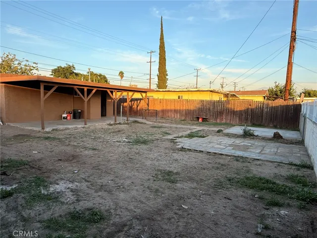 a house view with a backyard space