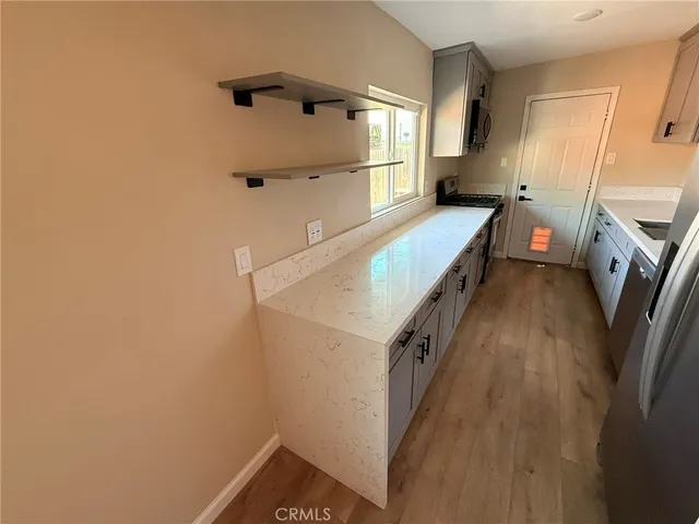a view of a kitchen with utility and utility room