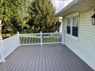 51 Homestead Road Freehold, NJ 07728 - Photo 12 of 20 a view of a wooden deck with a yard