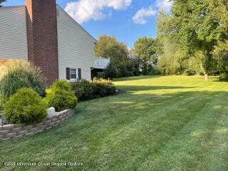 51 Homestead Road Freehold, NJ 07728 - Photo 17 of 20 a view of a house with a yard