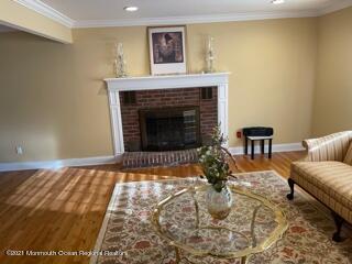 51 Homestead Road Freehold, NJ 07728 - Photo 4 of 20 a living room with a fireplace