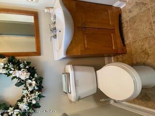 51 Homestead Road Freehold, NJ 07728 - Photo 5 of 20 a bathroom with a toilet and a sink